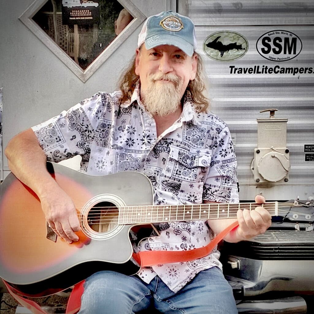 Rich Kienle with acoustic guitar
